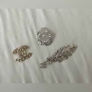 Chanel brooches